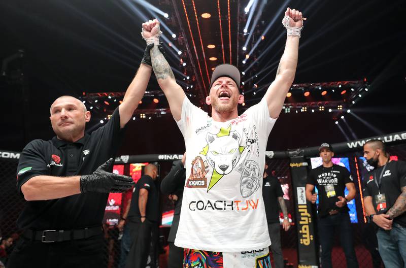 Jesse Arnett wins UAE Warriors featherweight title via stoppage from Ali Al Qaisi.